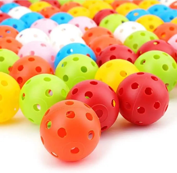 Multi-colour golf practice balls in red, orange, blue, green, white and yellow with net packaging