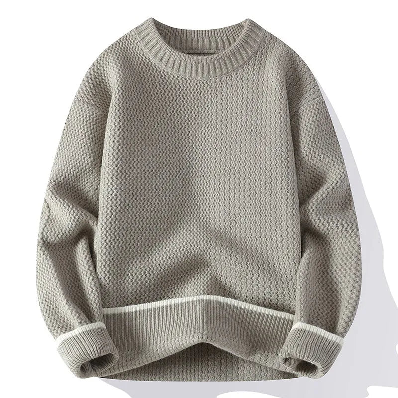 Grey men's loose fit round neck long sleeve casual pullover sweater on a hanger.
