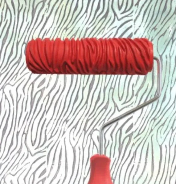 Red 7 inch texture paint embossing roller for creating patterned relief effects on walls