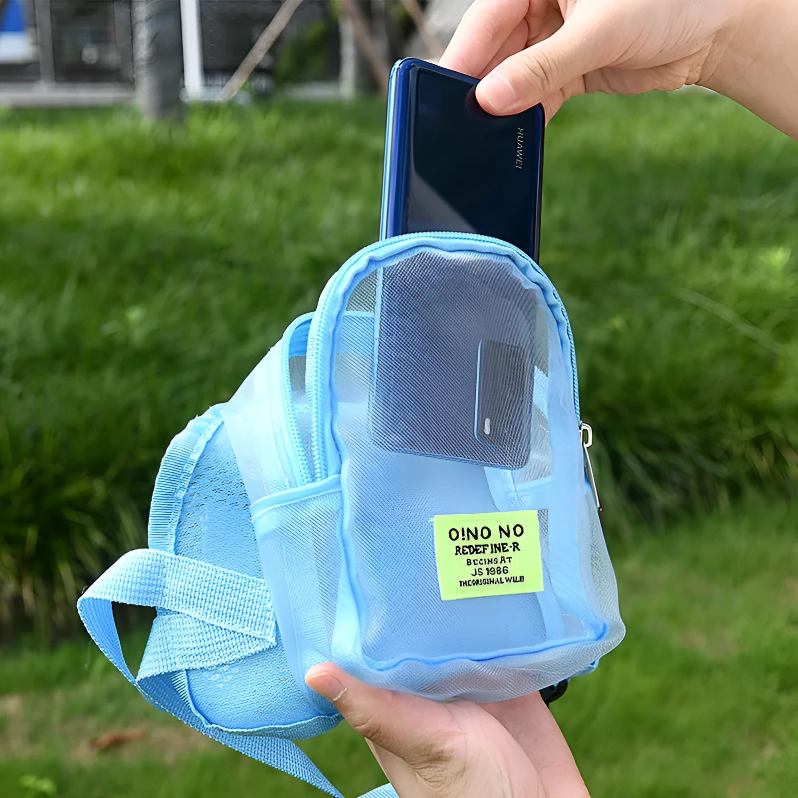 Blue breathable mesh dog backpack for small pets with adjustable shoulder straps.