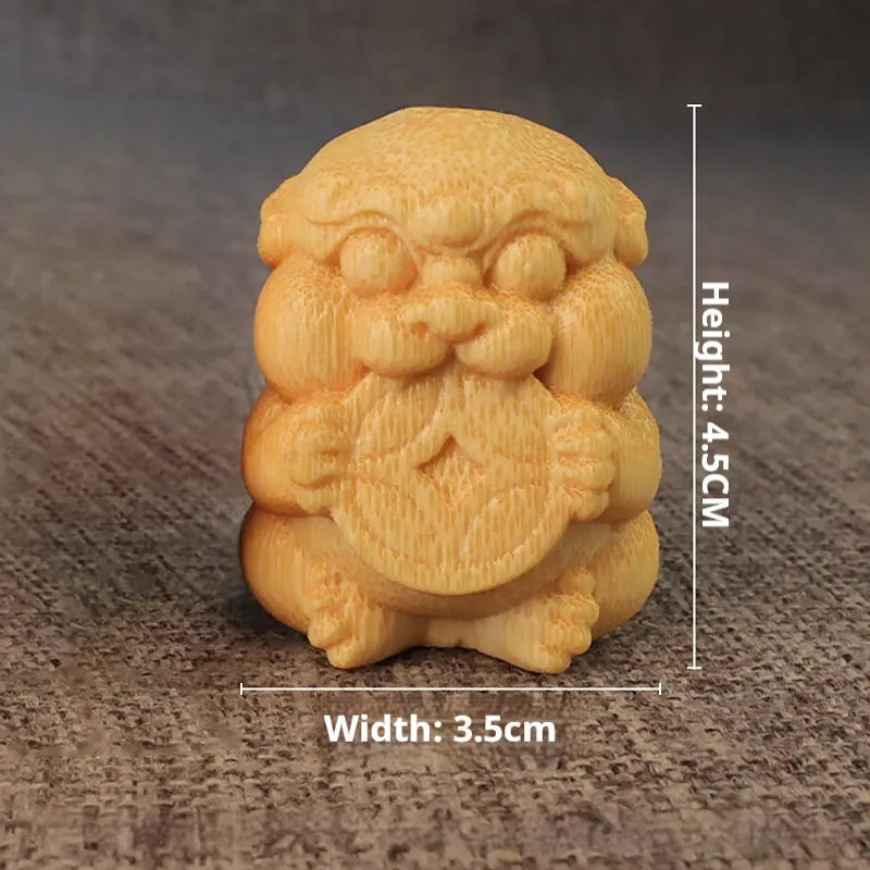 Solid bamboo carving ornament with traditional Take Money design measuring 4.5cm tall