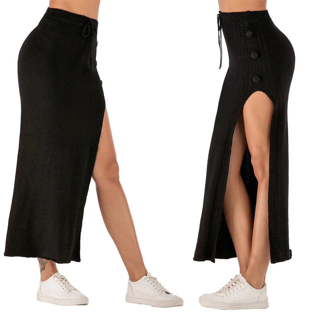 Women's black slim-fit acrylic midi skirt with a side split and strap detail on a hanger.
