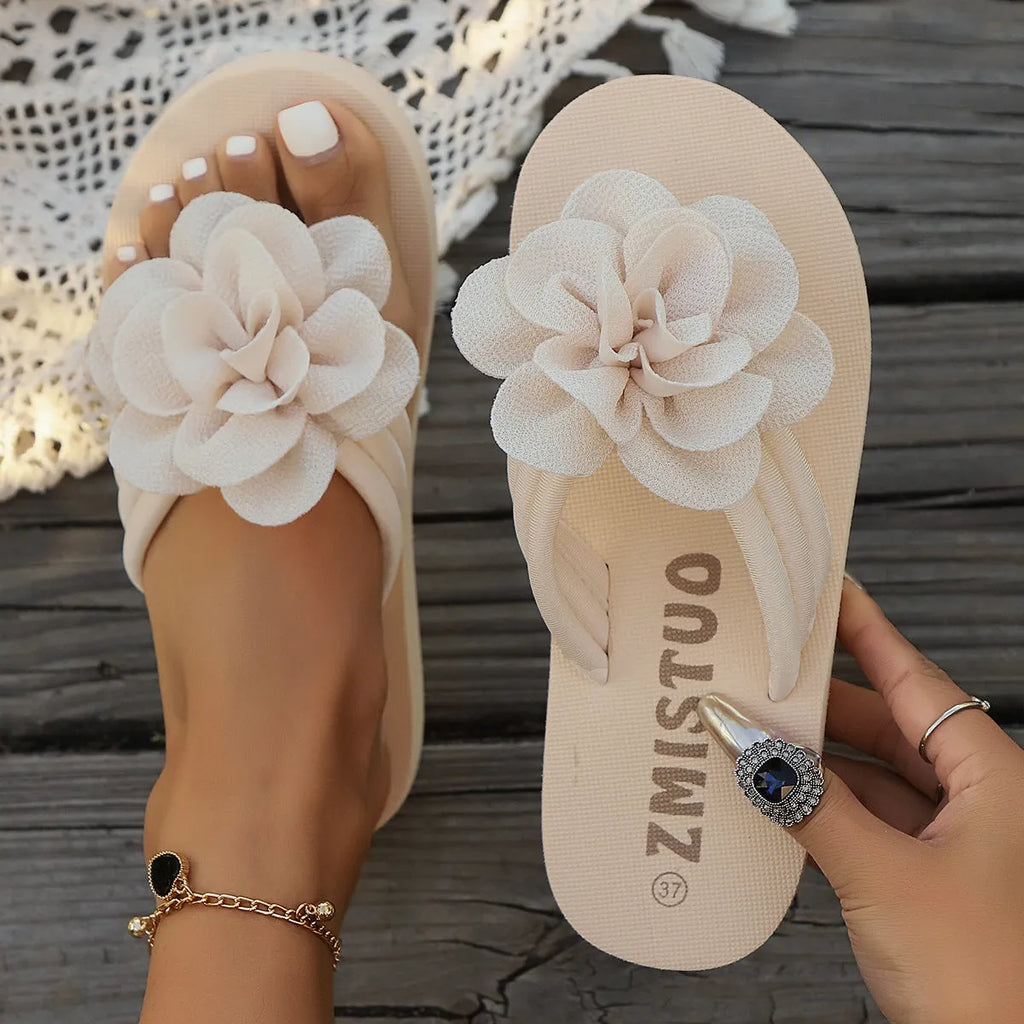 Plus size floral flip flop slippers in beige, green, and rose red on a white background.