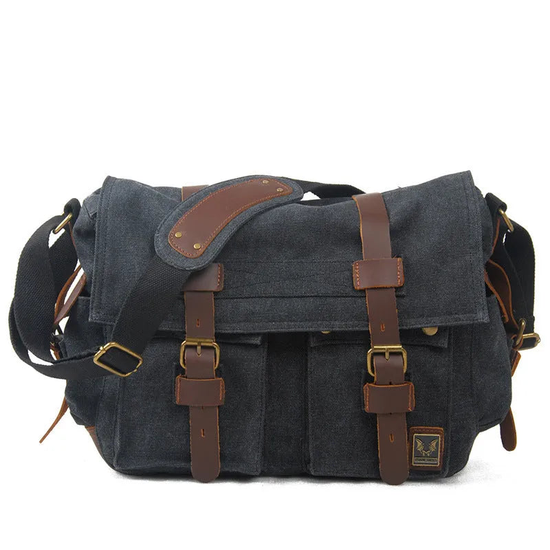 Men's brown canvas crossbody shoulder bag with cowhide trim and flap closure.