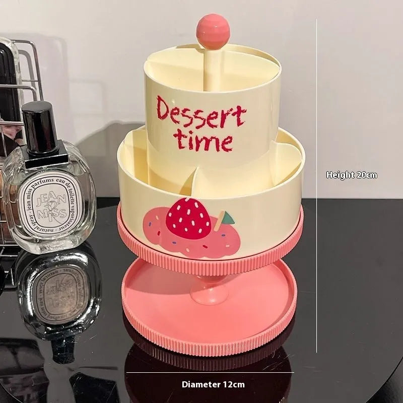 Rotating beige cosmetic brush storage barrel with 18-litre capacity and a separate storage rack on a table.
