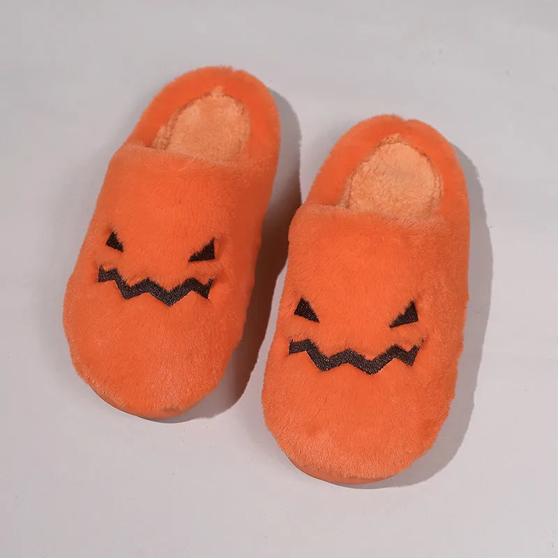 Orange Halloween pumpkin slippers with coral velvet exterior and plush lining