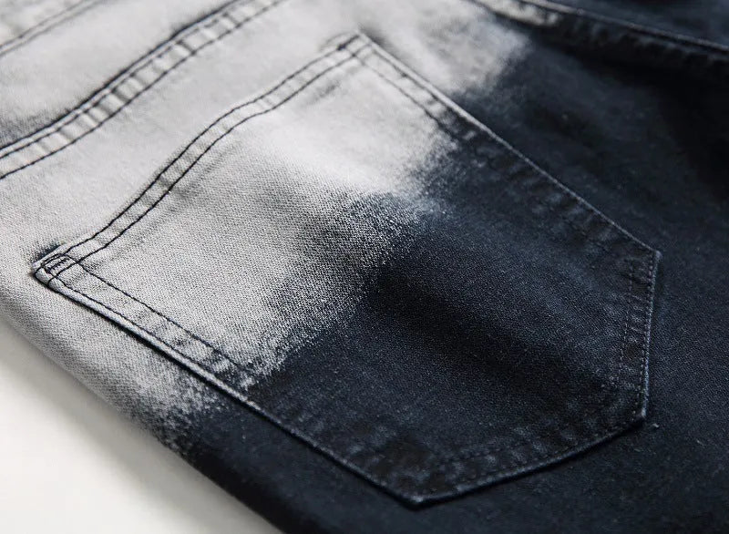 Men's blue and white faded cotton denim jeans with distressed worn finish, straight leg style