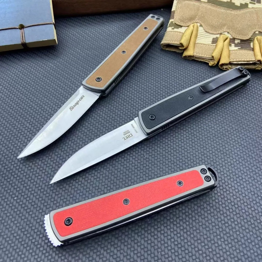 Folding fruit knife with stainless steel blade in black, coffee or red colour options showing extended and folded positions