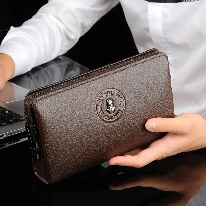 Men's business casual clutch made of soft PU leather, black, with visible sewing line detail and anti-theft design
