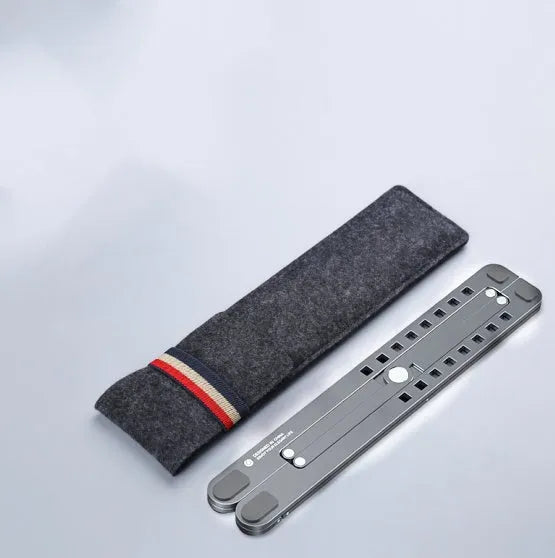 Foldable aluminium laptop stand in silver colour, shown in open and closed positions next to a laptop.
