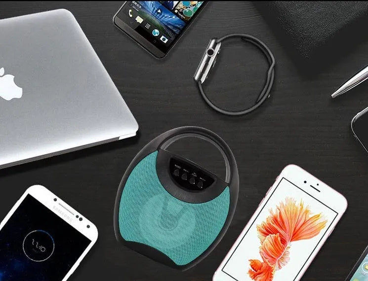 Portable Bluetooth speaker in black, blue or pink with USB port and SD card slot