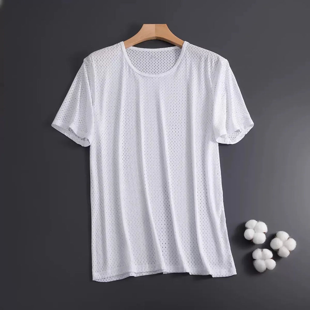 Man wearing a solid colour ice silk short sleeve crew neck T-shirt.