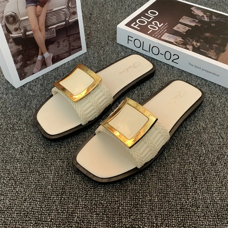 Women's apricot coloured flat casual slippers with a textured PVC sole, shown on a light background.