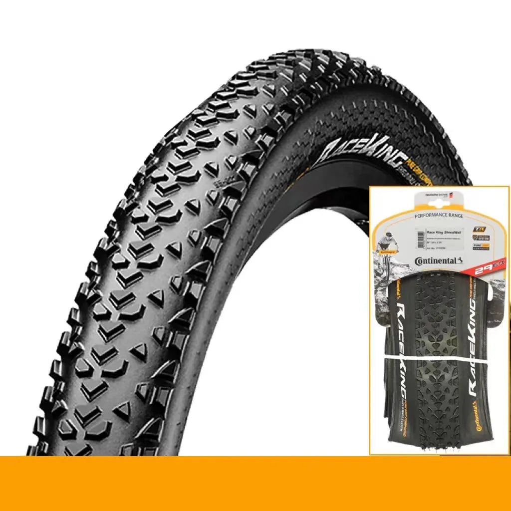Mountain bike outer tyre showing yellow sidewall, with folding bead and tread pattern for off-road use.