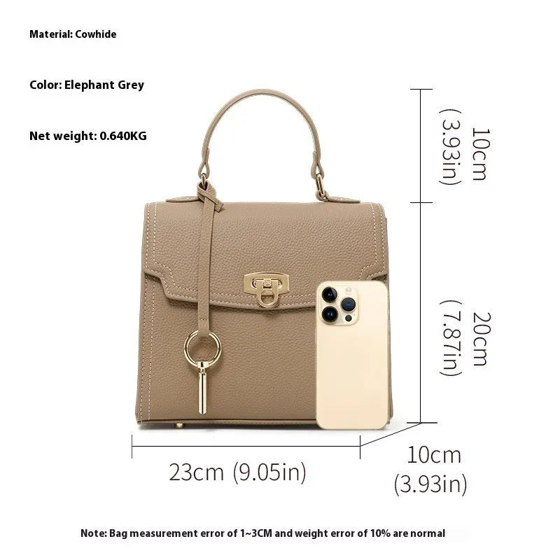 Elephant grey square genuine leather handbag with a vintage lock and textured litchi pattern.