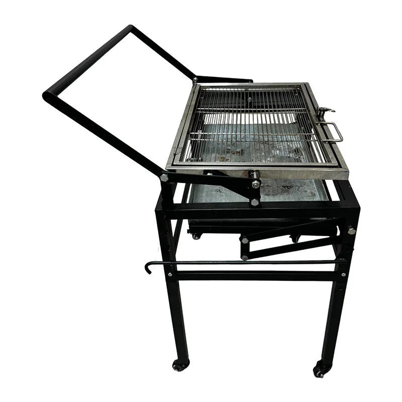 Large foldable Flip BBQ Stove charcoal grill with detachable metal frame set up in a garden.