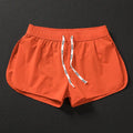 Men's elastic beach shorts in orange, green, and black colours for surfing and summer wear