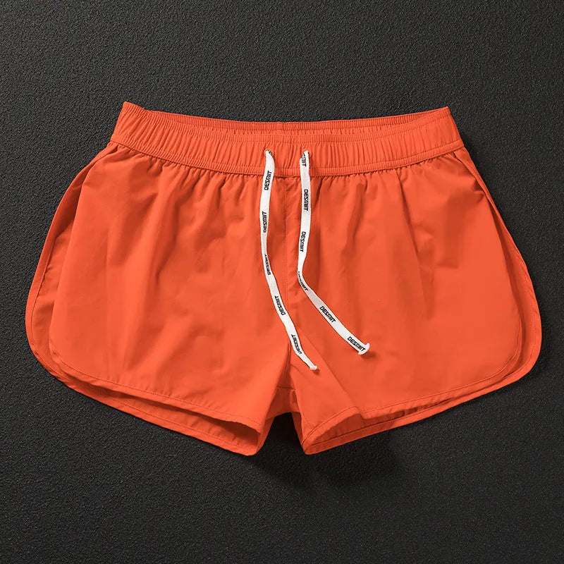 Men's elastic beach shorts in orange, green, and black colours for surfing and summer wear