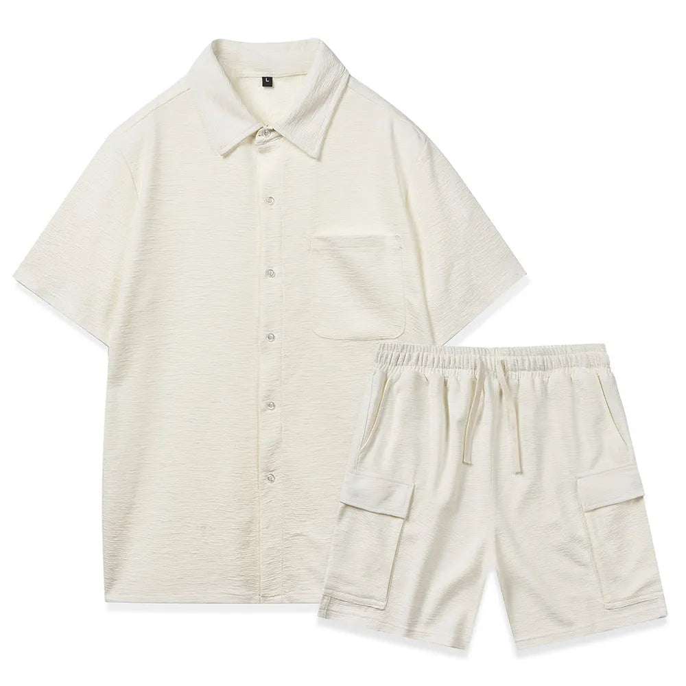 Women's beige polyester two-piece lounge set with short sleeves and elastic waist shorts laid flat.
