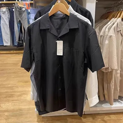 Man wearing a beige open collar casual shirt made from a cotton modal blend with Japanese styling