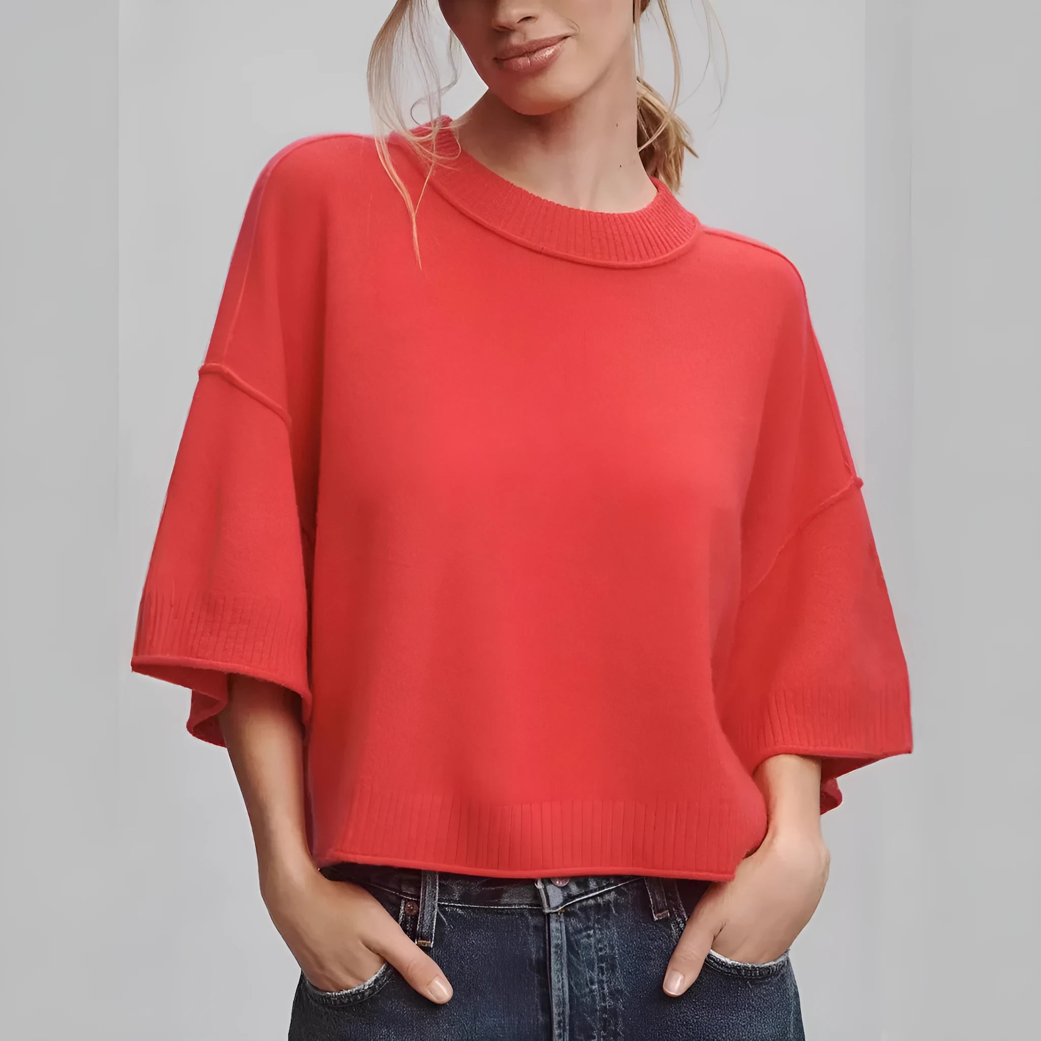 Red cropped viscose T-shirt with an exposed navel design on a mannequin, showing the short length and regular sleeves.