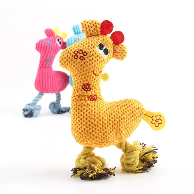 Blue deer shaped plush dog toy with corn grain texture, shown with a dog.