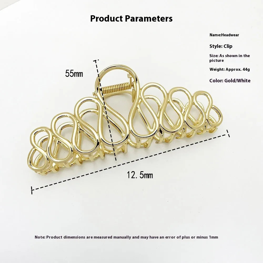 Large minimalist updo hair clip with tassel detail in gold or silver electroplated finish