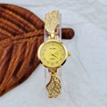 Women's stainless steel watch with a round dial shown in gold, black and gold, and white and gold colour options