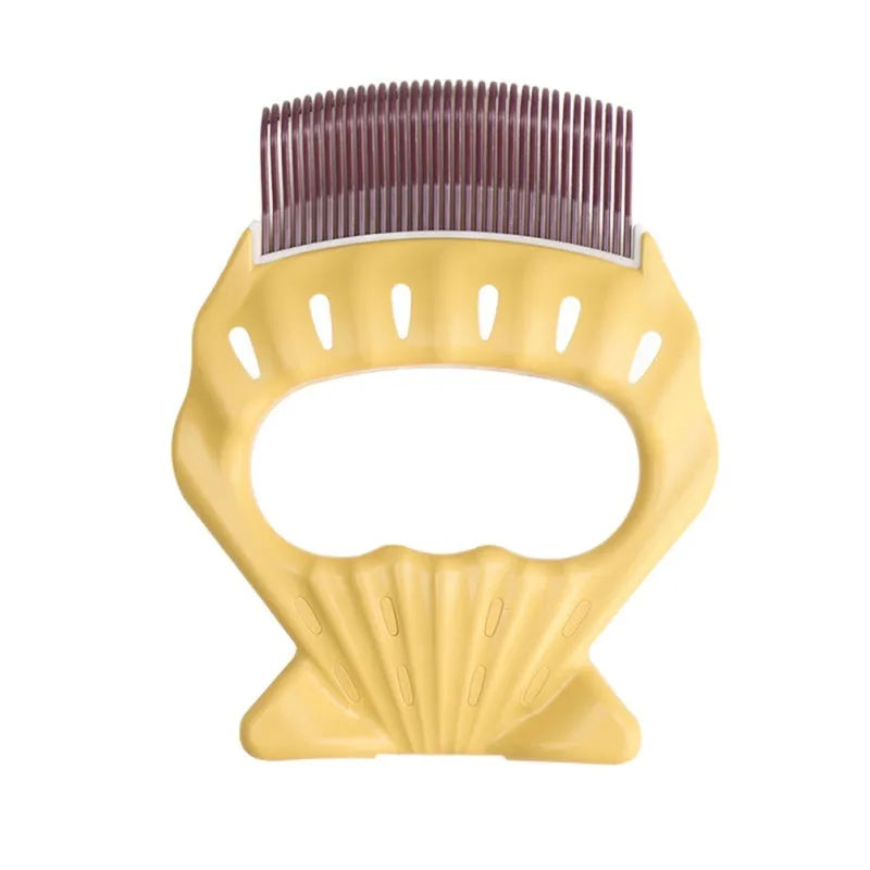Green shell-shaped pet grooming comb with bent wire bristles and a plastic handle.