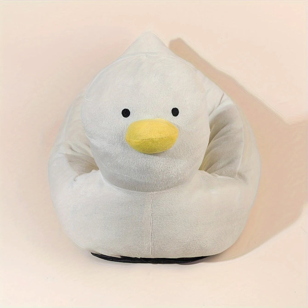 Blue duck-shaped fluffy pet bed sofa for small dogs and cats on a wooden floor.