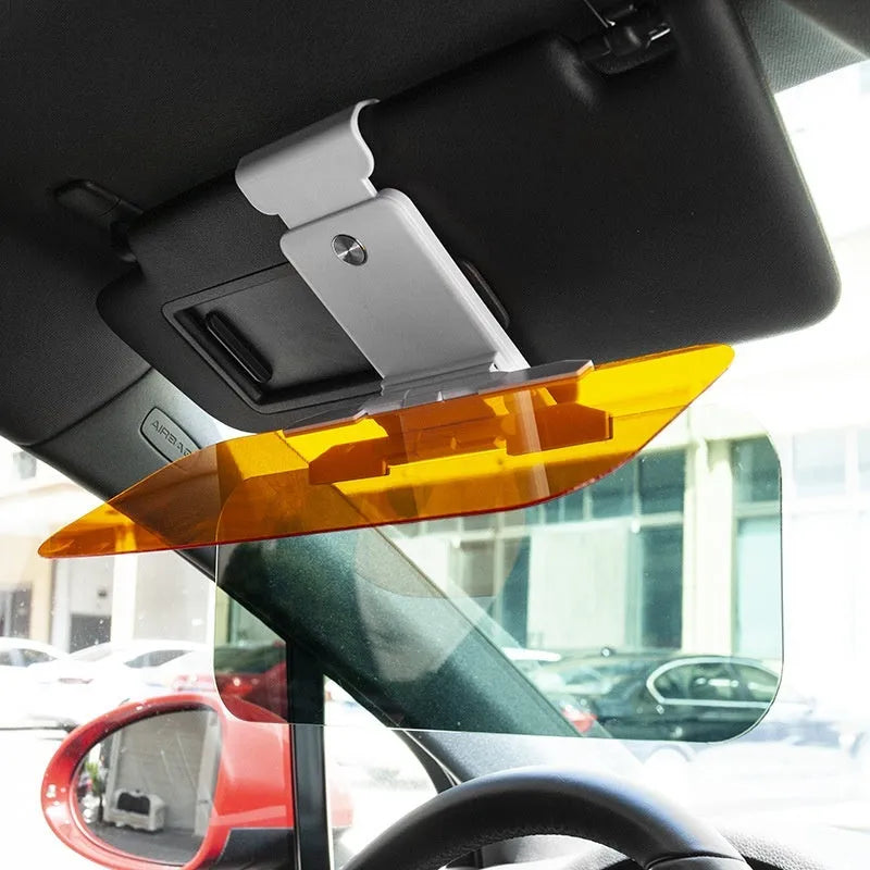 Telescopic anti-glare car sun visor with acrylic lens shown mounted in a vehicle.