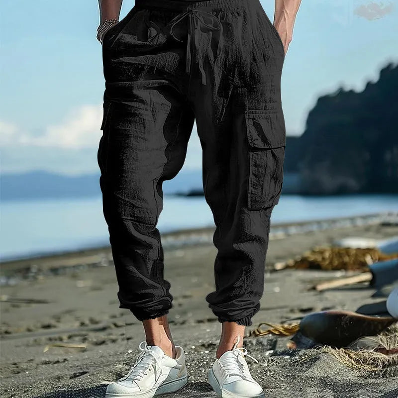Men's linen trousers with ankle ties and multiple pockets in army green colour
