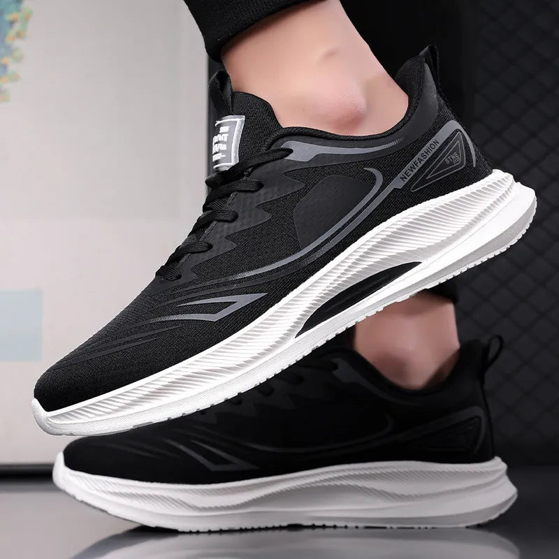Men's low-top casual trainers with woven mesh upper and rubber sole in black, blue-grey, and green-grey colours.
