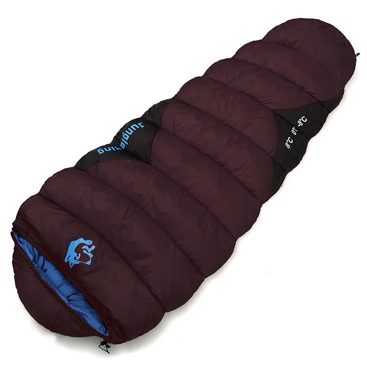 Mummy style camping sleeping bag in a colour option, shown next to its compression sack.