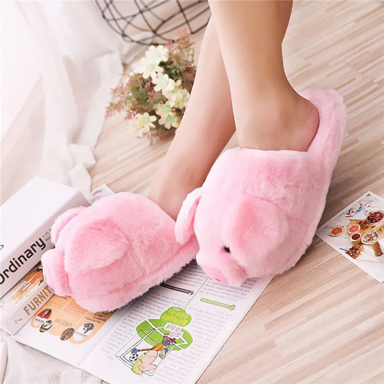 Pink pig floor slippers with short plush material showing size conversion chart for international measurements