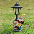 Solar hexagonal garden lamp with decorative resin animal sculpture in American country style