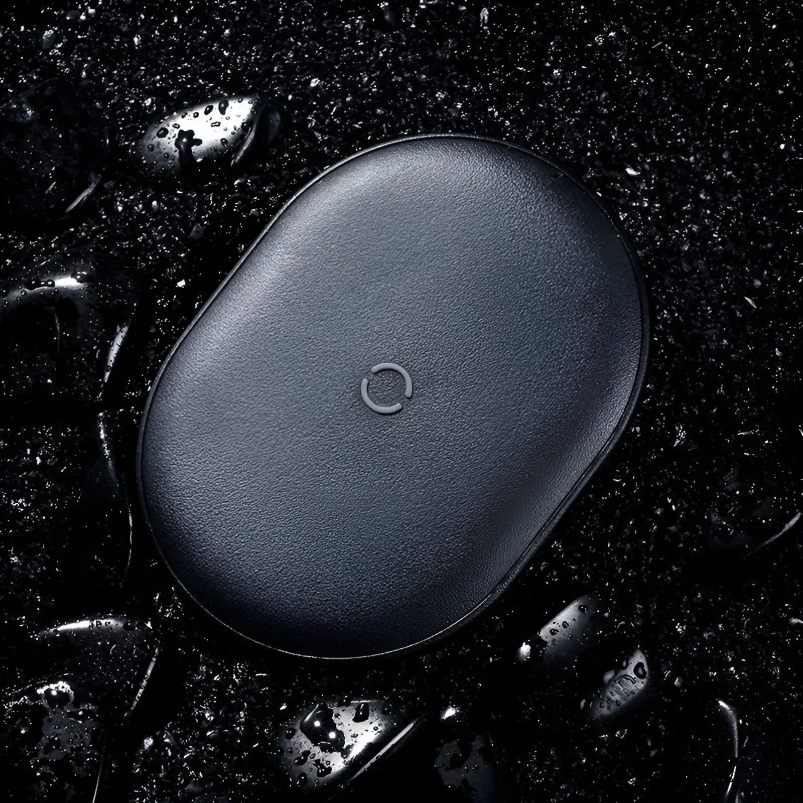 Baseus Rough 15W wireless charging pad in black and white on a table