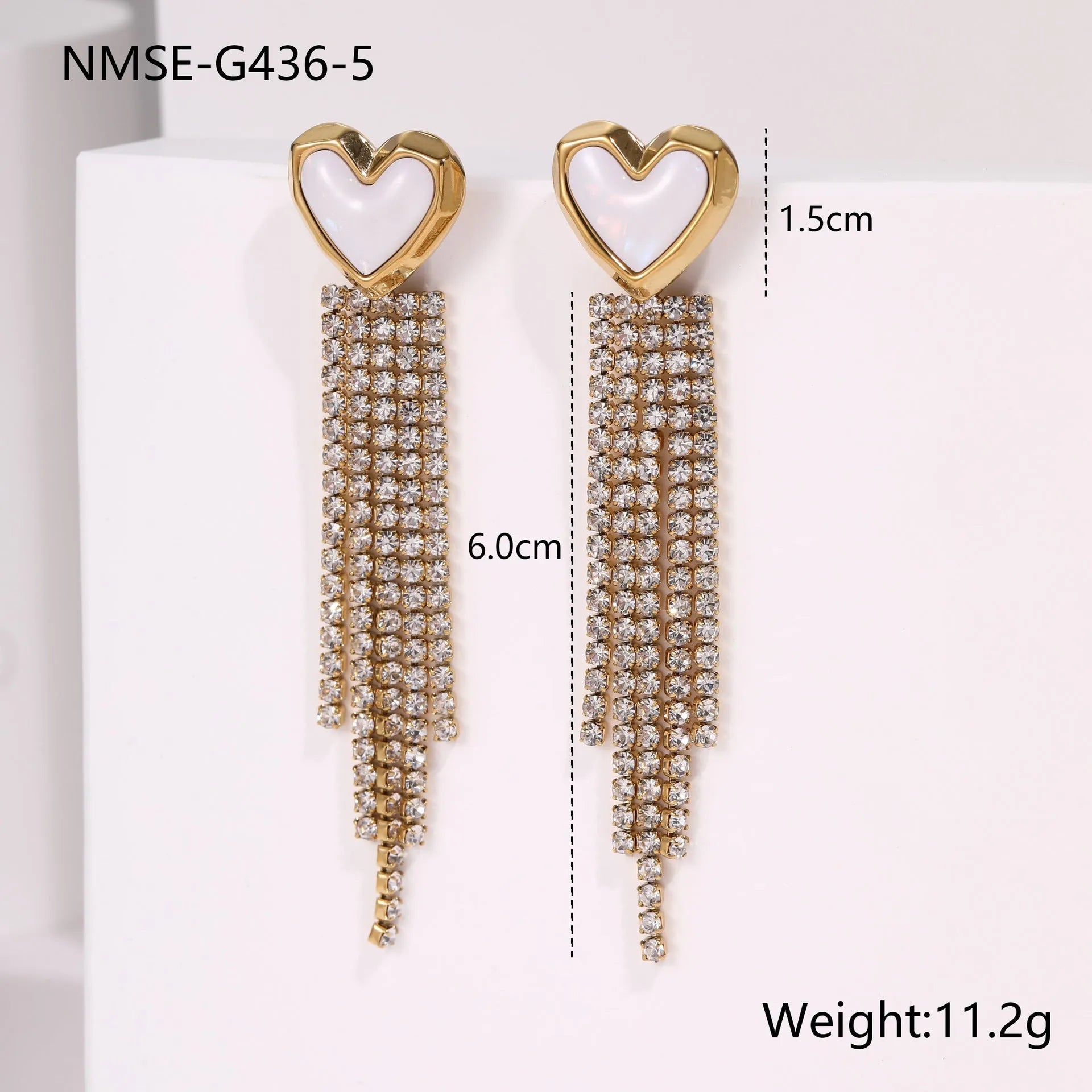 Pair of 18K gold plated stainless steel earrings featuring heart and star shapes with diamond tassels
