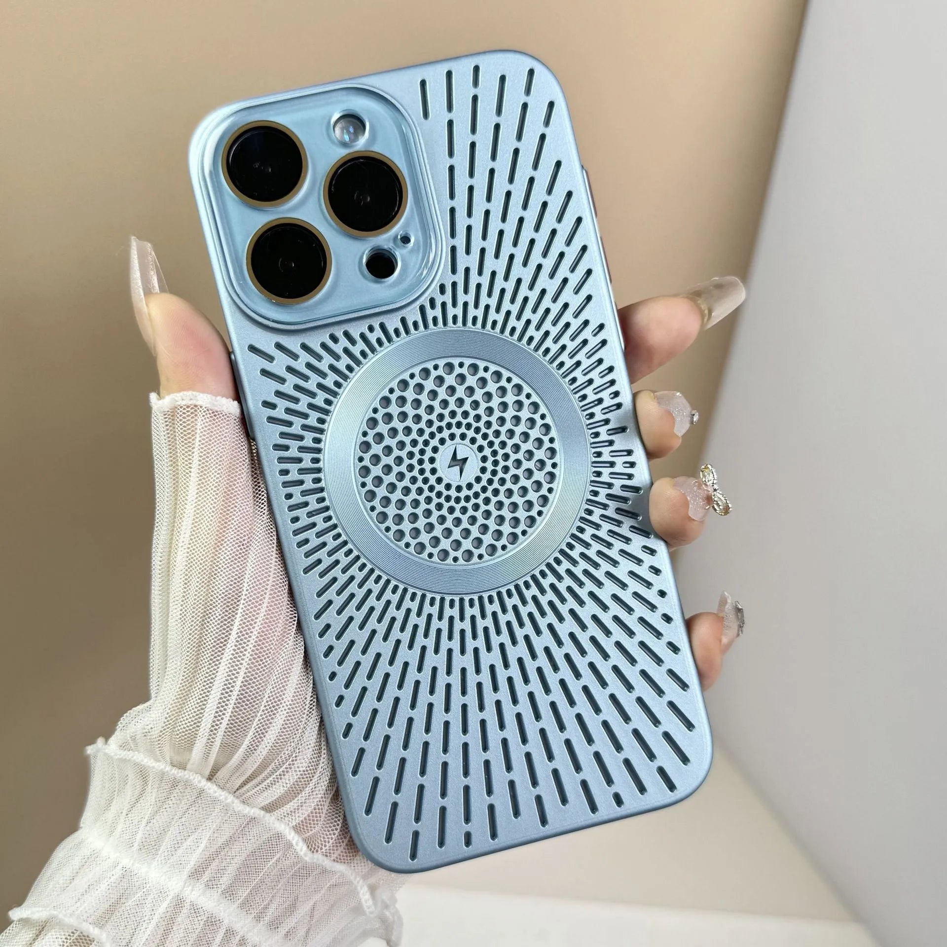 Hollow PC phone case with heat dissipation network and magnetic charging for iPhone, in platinum silver