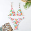 Women's halter-neck polyester bikini briefs in floral print with multiple colour options
