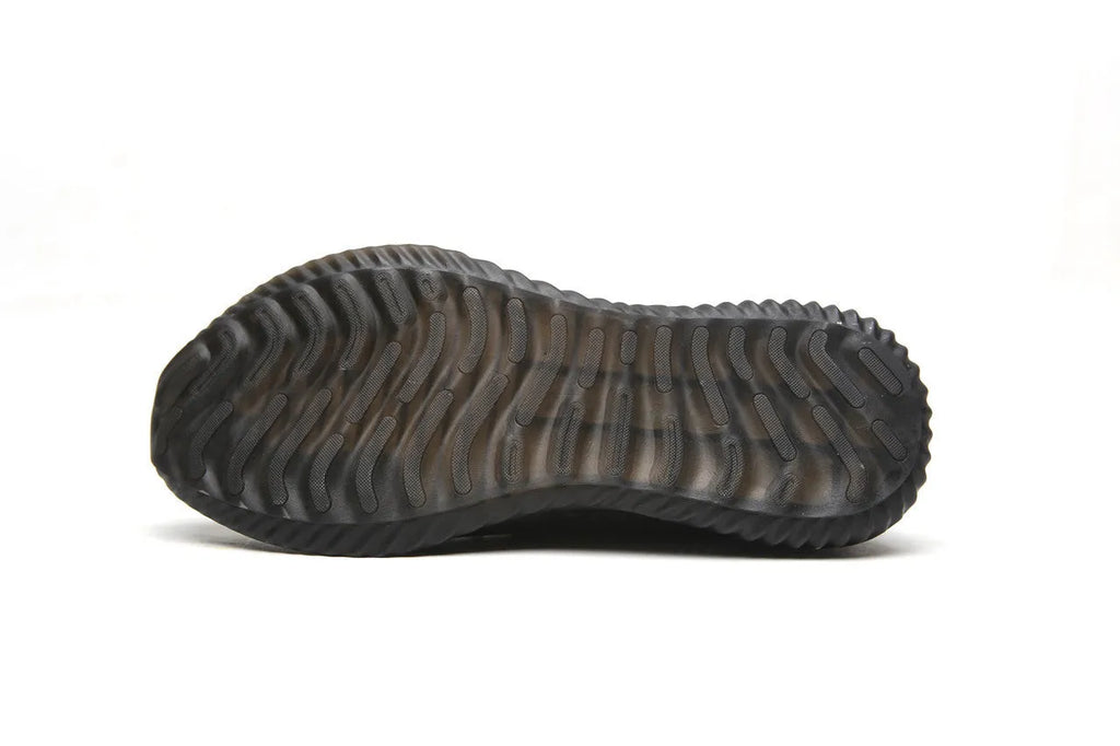 Black low-cut steel toe safety shoes with anti-static EVA sole on a work surface