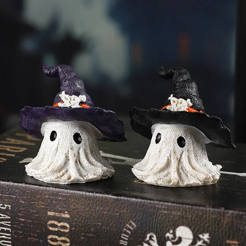 Small resin wizard hat ghost ornament in black or purple for holiday decoration.