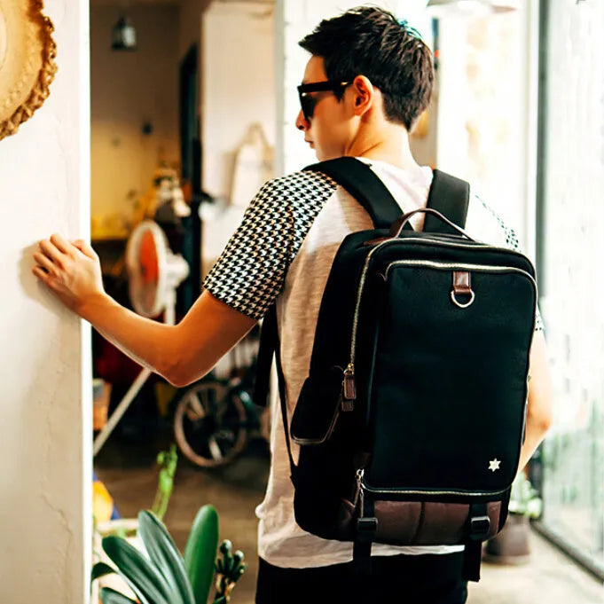 Korean-style men's Oxford cloth backpack in Army Green, showing its large capacity and dimensions.