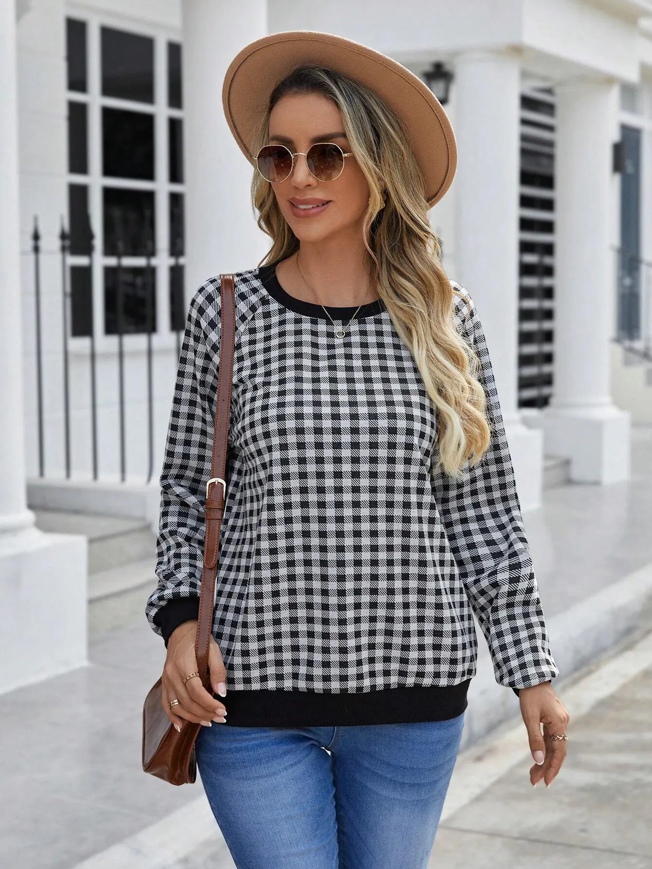 Black Japanese plaid pattern pullover sweater with printed design and long sleeves