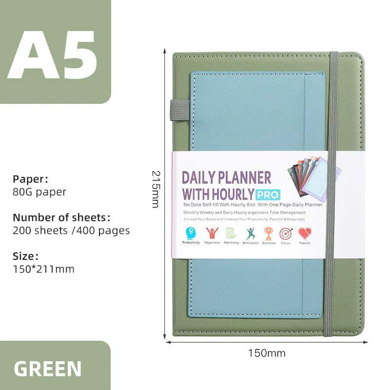 A6 self-filled notebook with PU cover in various colours, shown open on wooden table.
