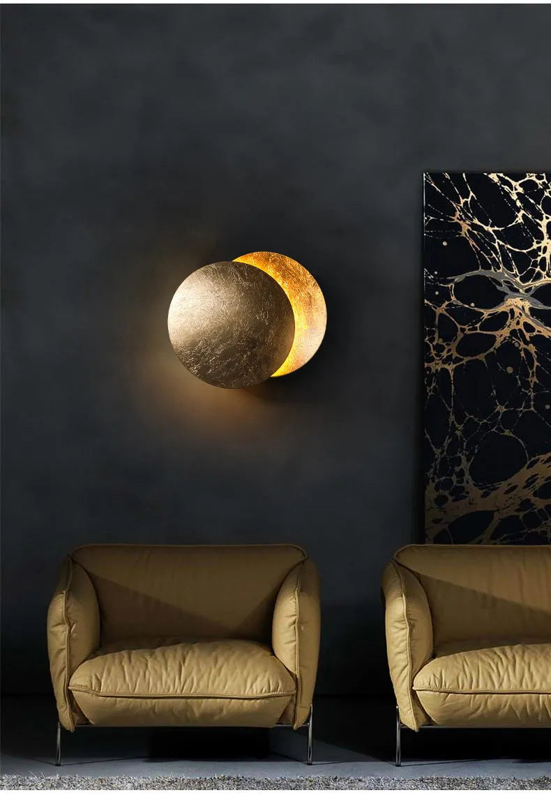 Modern minimalist aluminium bedside lamp with golden light in inner gold outer black finish