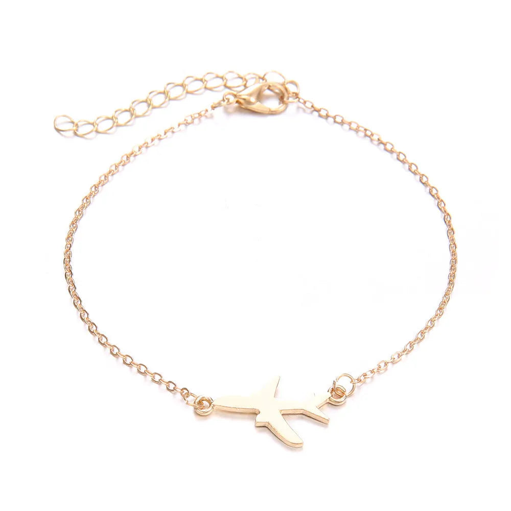 Three bohemian bracelets with aircraft map charm pendants in heart shape design