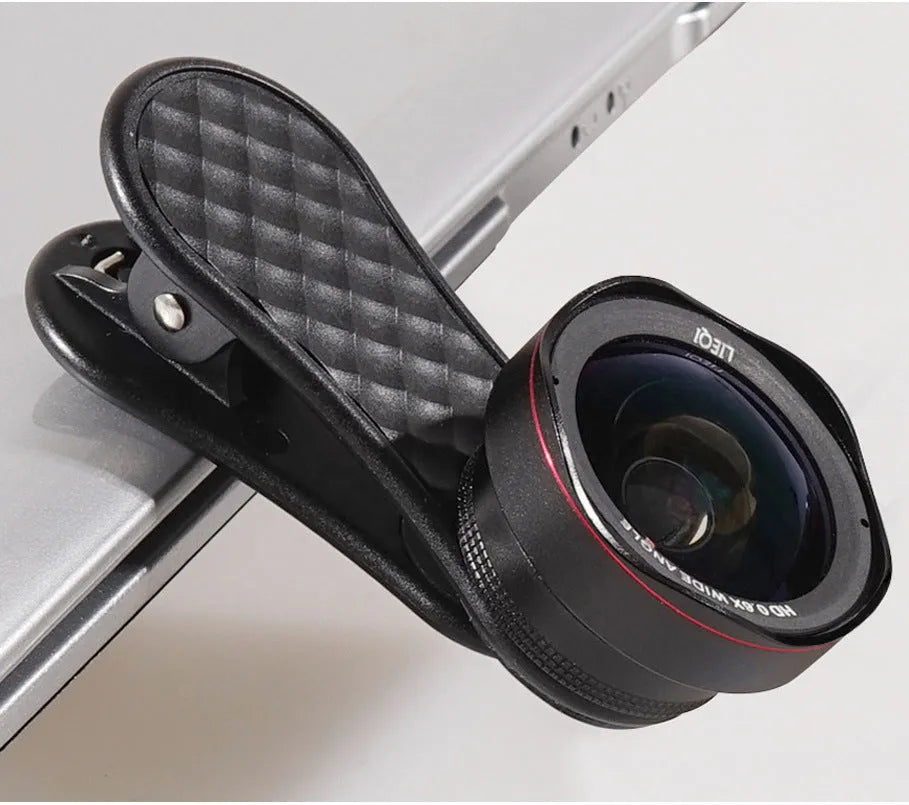 LQ-046 smartphone lens kit showing wide-angle and macro lenses, phone clip, and storage box in black.