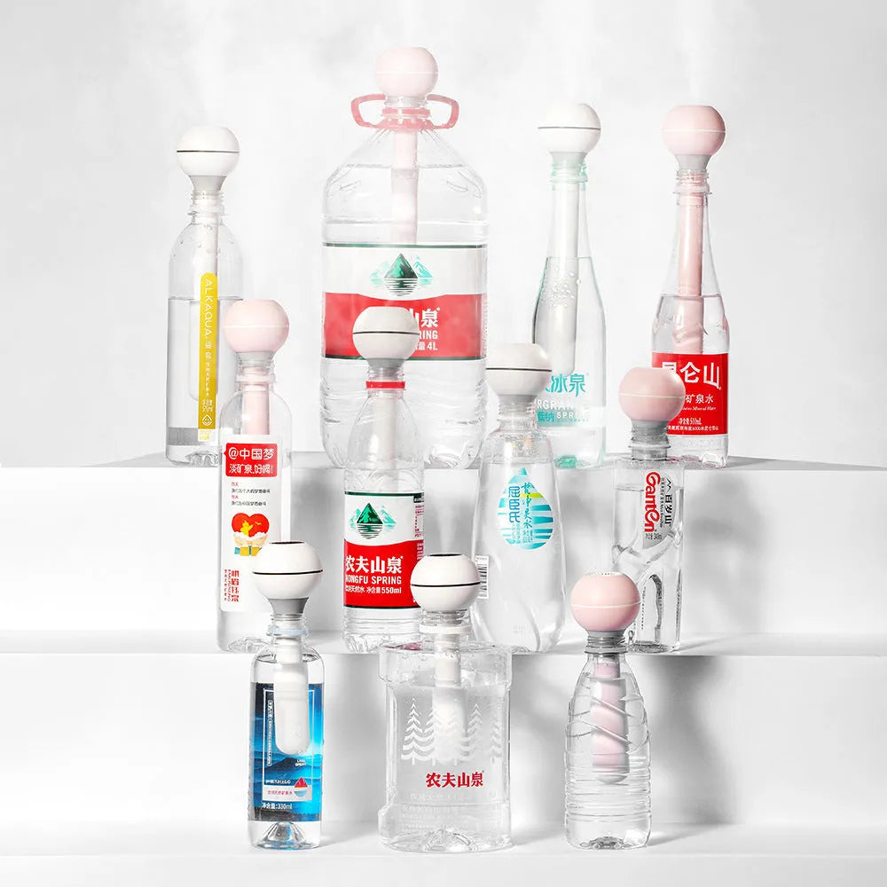 Magic wand ultrasonic humidifier in columnar shape with USB port and 1 litre water tank.