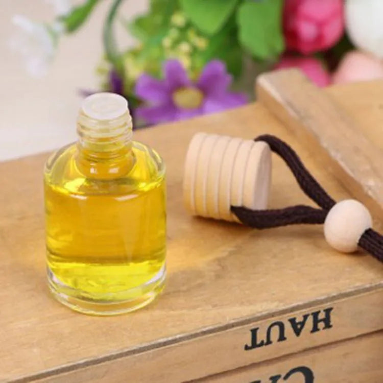 Car air freshener glass bottle hanging ornament with 55g net content, available in six scents including lavender and lemon